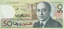 Marocco 50 Dirhams - Hassan II facing, Mounted Milicia charging - 1987 - XF to AU - P.61a