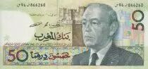 Marruecos 50 Dirhams - Hassan II - Mounted Milicia charging - 1987 - AU to UNC - P.64c