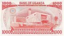 Uganda 1000 Shillings Emblemas - Edificio - 1986