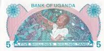 Uganda 5 Shillings - Building - Young woman - 1979 - Serial A.86 - P.10