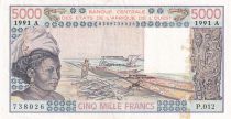 West AFrican States 5000 Francs - Woman, fish, boat- 1991 - Lettre A ( Côte d\'Ivoire) - Serial P.012 -P.108Ar